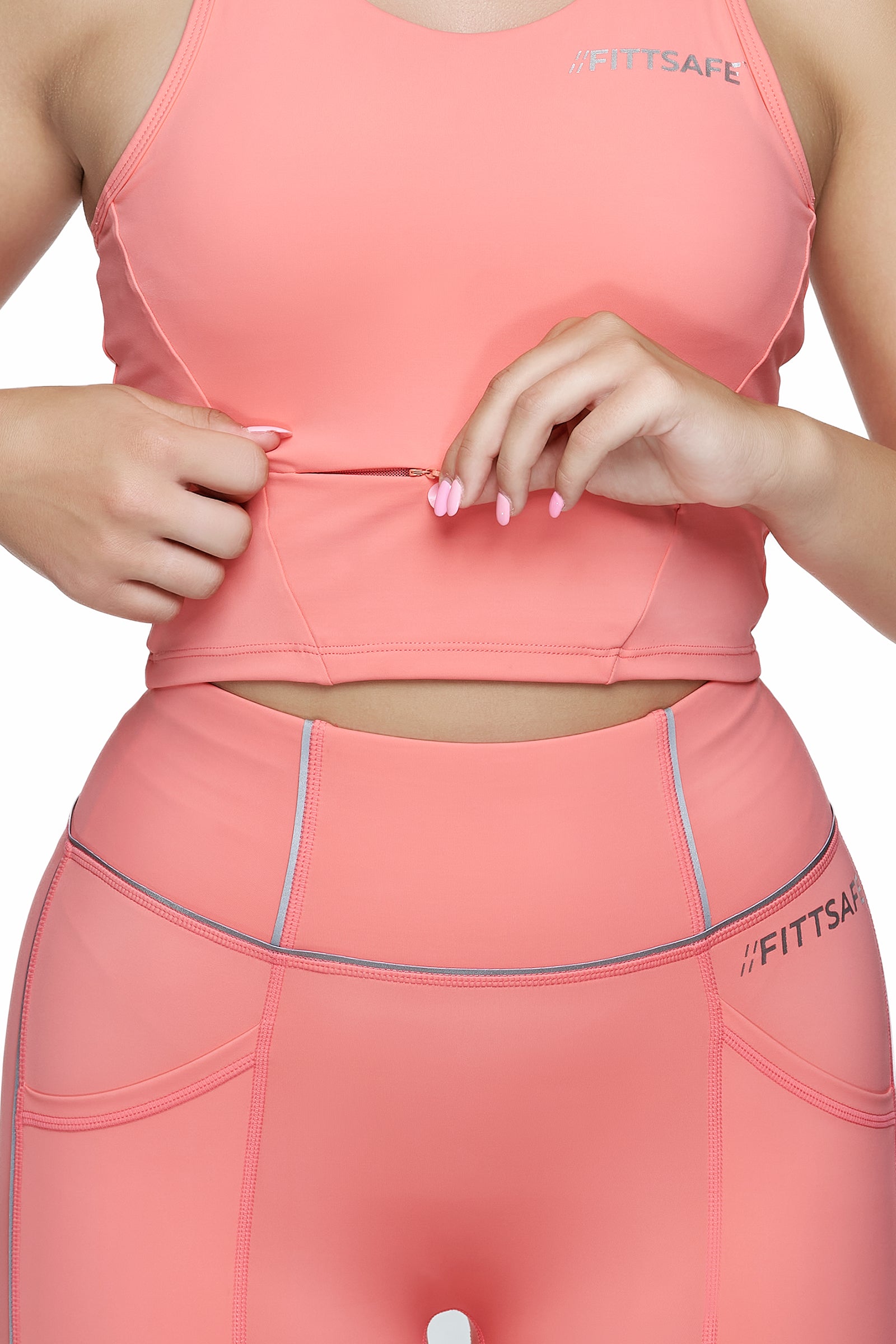 Coral FittSafe Leggings and top with built in pockets